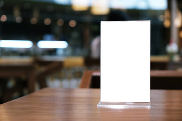 istock Menu frame standing on wood table in Bar restaurant cafe. space for text marketing promotion. 1094835250
