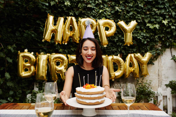 Cropped shot of an attractive young woman celebrating her birthday outdoors