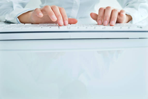 Businesswoman hands typing on the keyboard.
