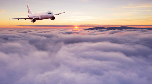 istock Commercial airplane jetliner flying above dramatic clouds. 1094840838
