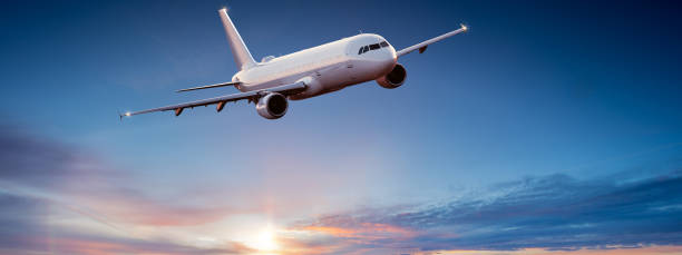 istock Commercial airplane jetliner flying above dramatic clouds. 1094840890