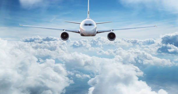 istock Commercial airplane jetliner flying above dramatic clouds. 1094840990