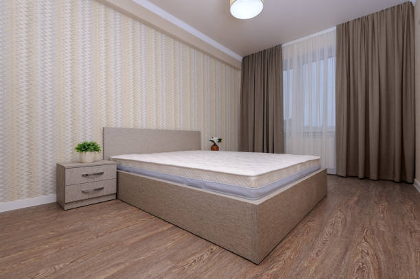 istock New empty brown bedroom with twin bed, bedside tables and curtain 1094843390