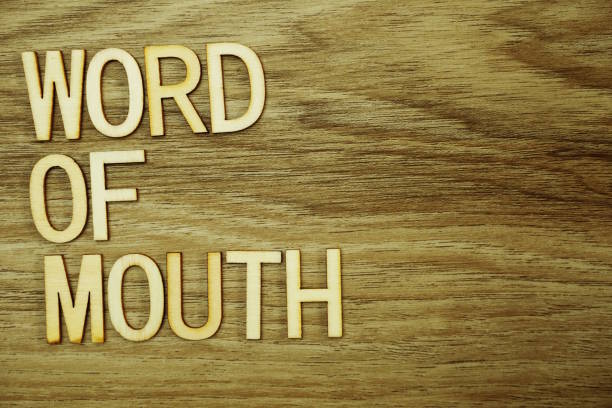 istock Word Of Mouth text message on wooden background 1094843752