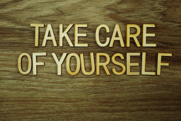 istock Take care Of Yourself text message on wooden background 1094843786