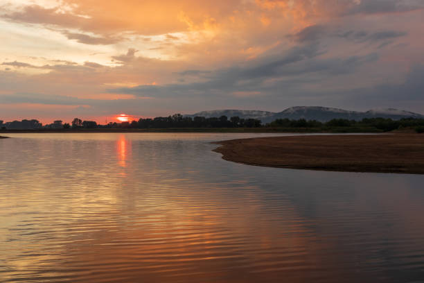 istock Sunset on a lake in Hohenrode in Germany 1094844816
