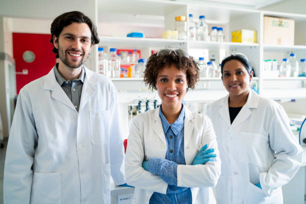 istock Portrait of scientists smiling in laboratory 1094849446
