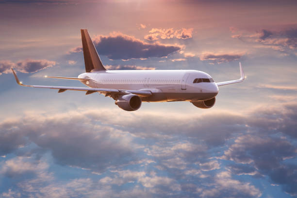 istock Commercial airplane jetliner flying above dramatic clouds. 1094849706