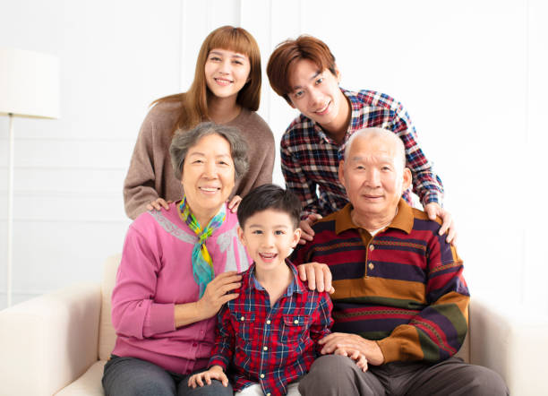 istock happy three generations asian family on sofa 1094851116