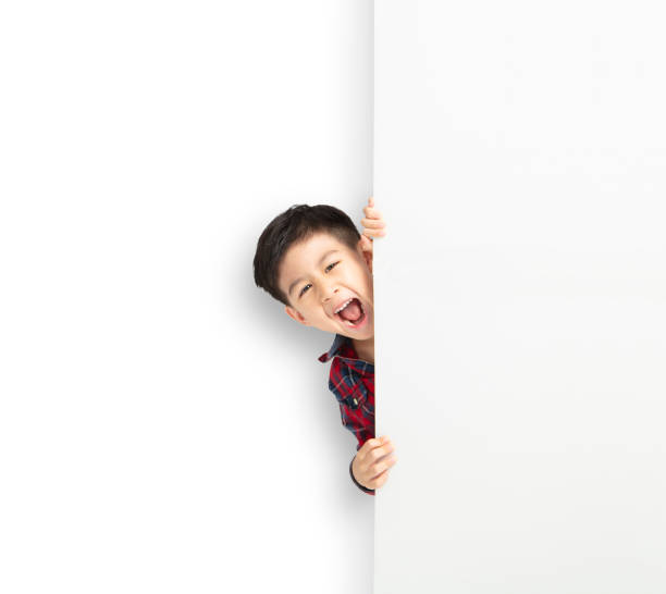 istock happy asian boy showing the white board 1094851266