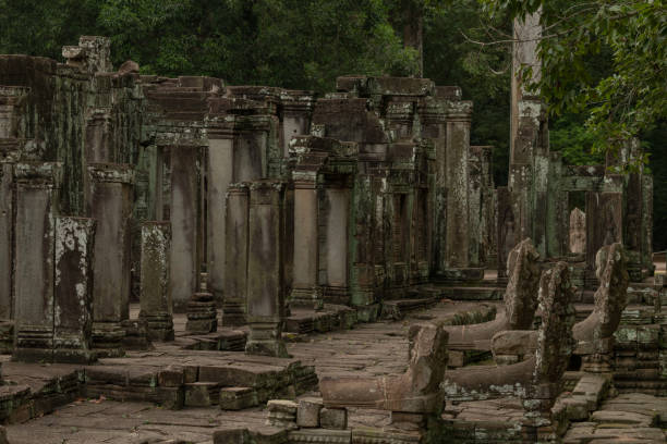 istock Ruined columns of Bayon temple in forest 1094851582
