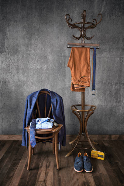 istock Men’s clothing  isolated on parquet floor 1094853348