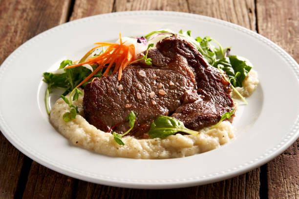 リブアイ ステーキ - rib eye steak steak beef prepared potato ストックフォトと画像
