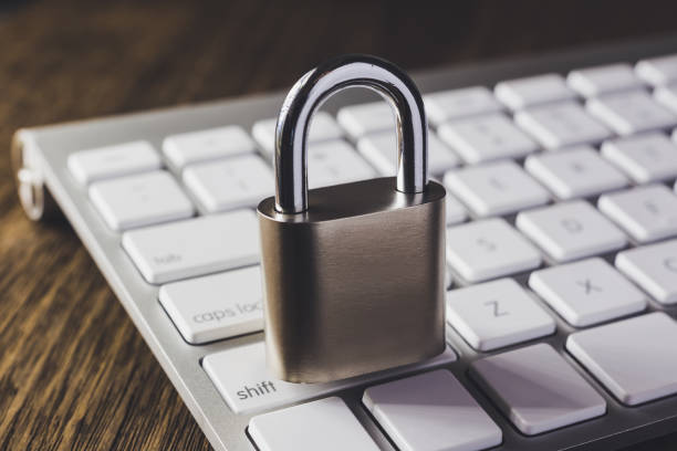 istock Close key lock on keyboard, dim light dark tone. 1094885910