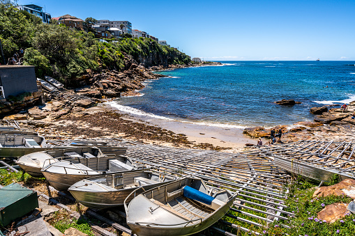 Gordon's Bay view with small boats on the shore during Bondi to Coogee coastal walk in Sydney NSW Australia