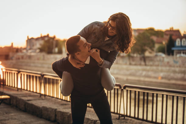 istock Young couple having fun by the river 1094887790