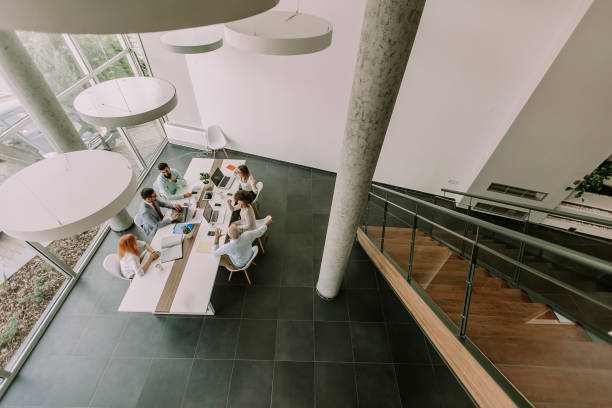 istock Top view at business people working in office 1094891388