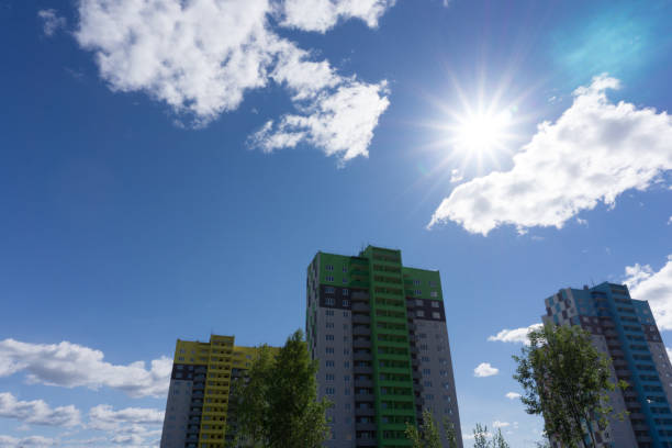 istock Modern white building with balcony on a blue sky . 1094894796
