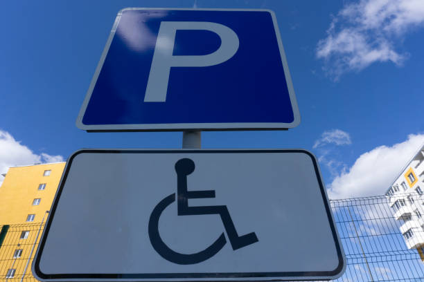 istock Parking for drivers with disabilities Legislation requires that all car parks in the provided only Parking spaces for disabled persons. 1094900376