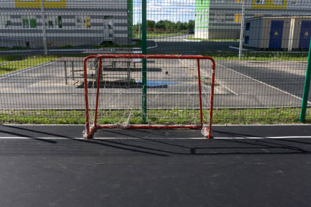 istock Red hockey goal. Front view from ice . 1094900770