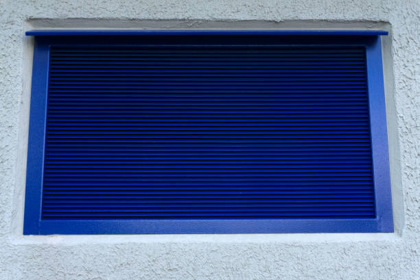 Yellow radiator cooling grill at construction machine