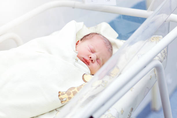 istock Newborn at the maternity ward 1094909434