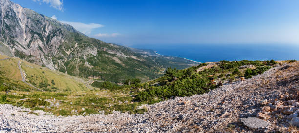 Summer Llogara pass view with serpentine road and Ionian Sea coast (Albania)