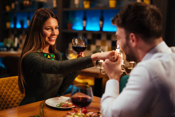 istock Couple having romantic dinner in a restaurant 1094916184