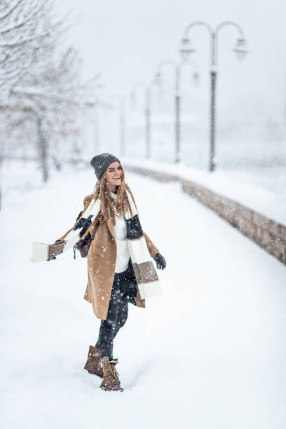 istock Playful woman on the snow 1094918090