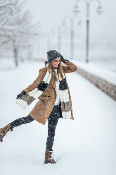 istock Playful woman on the snow 1094918306