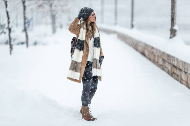 istock Playful woman on the snow 1094918770