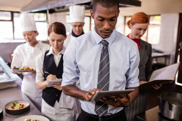 istock Group of hotel staffs working in kitchen 1094919490