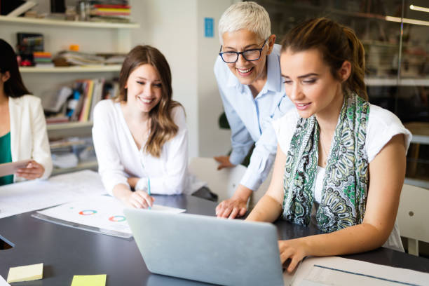 istock Successful group of business people at work in office 1094921558