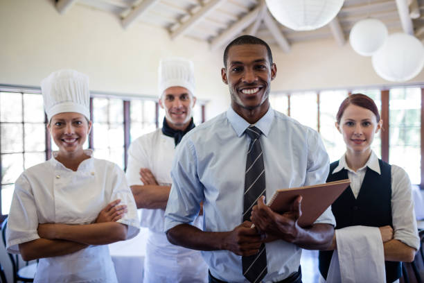 istock Group of hotel staffs standing in hotel 1094924288
