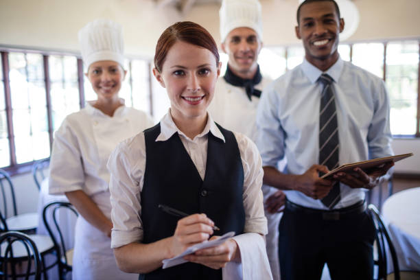 istock Group of hotel staffs standing in hotel 1094924418