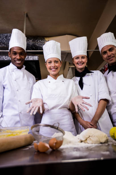 istock Female chef preparing food in kitchen 1094925112