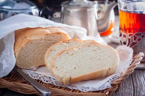 istock Homemade white bread in a rustic style, sliced, horizontal 1094925666