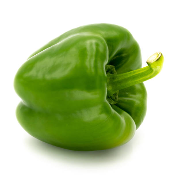 istock Green bell pepper balls isolated on a white background. 1094929318