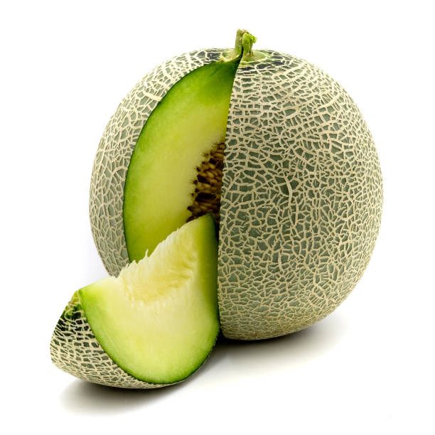 istock Green melon slices isolated on white background. 1094933118