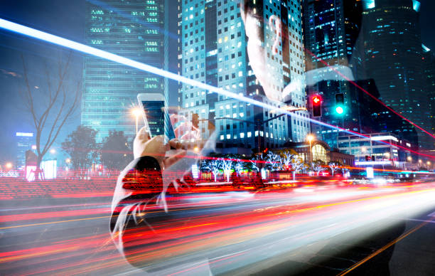 Multiple exposure of businessman using mobile phone.
