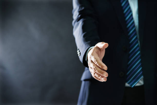 istock Businessman giving hand for handshake 1094935160
