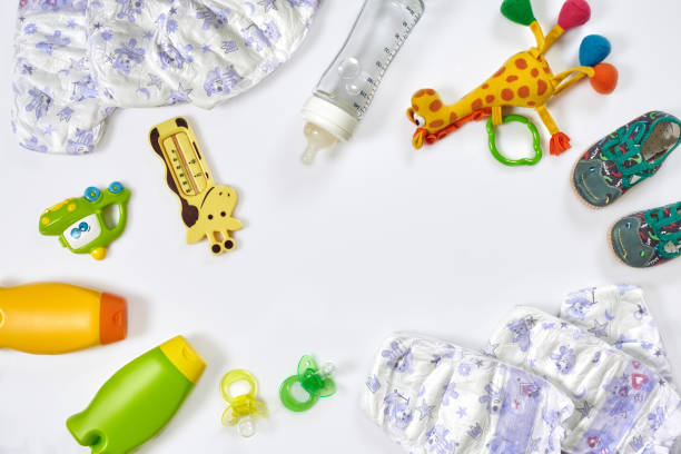 istock Set of accessories for baby. Pacifier, bottle, diaper, cream on white background. 1094939228