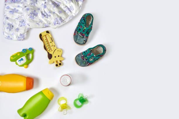 istock Set of accessories for baby. Pacifier, bottle, diaper, cream on white background. 1094939236