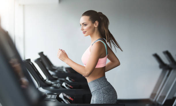 istock Sports woman doing cardio training on treadmill 1094959924