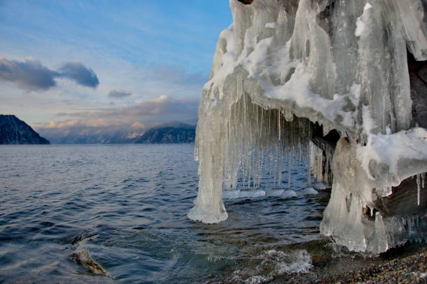 istock Winter sunset on lake Teletskoye. 1094962706