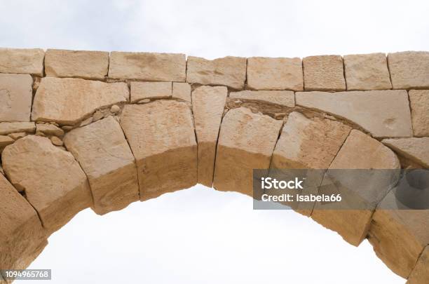 Ancient Stone Arch And Keystone In The Sky Closeup Stock Photo - Download Image Now - Arch - Architectural Feature, Stone Material, Key