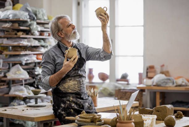 istock Portrait of a Senior man Creating Pottery 1094970638