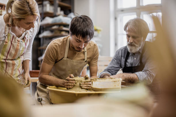 istock Small Group of People Creating Pottery 1094970754