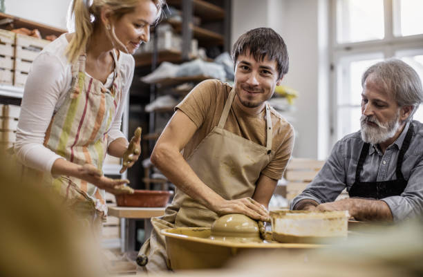 istock Small Group of People Creating Pottery 1094970804