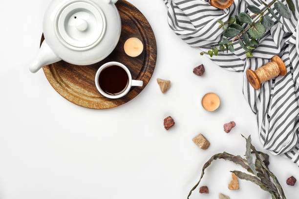 istock Cup with a ready tea on a white table. Top view, flat lay. Copy space 1094974386